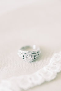 Wedding bands with lace veil.