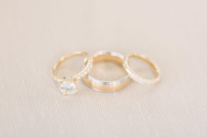 Gold rings wedding photography.