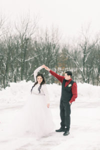 winter wedding bride and groom portrait in snow